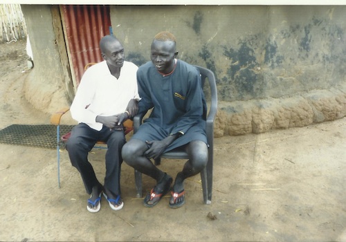 Two men sitting och chairs